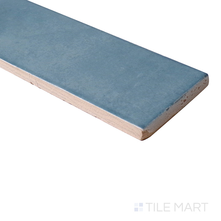 Angled shot showcases the vibrant, glossy finish of Safi Aqua 2X6 Glossy Ceramic, reflecting light beautifully for a fresh, modern look.