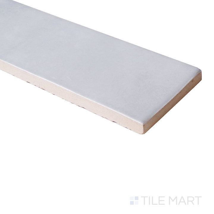 Side view highlights the sleek, neutral tones of Safi Grey 2X6 Glossy Ceramic, enhancing contemporary interiors with its refined sheen.