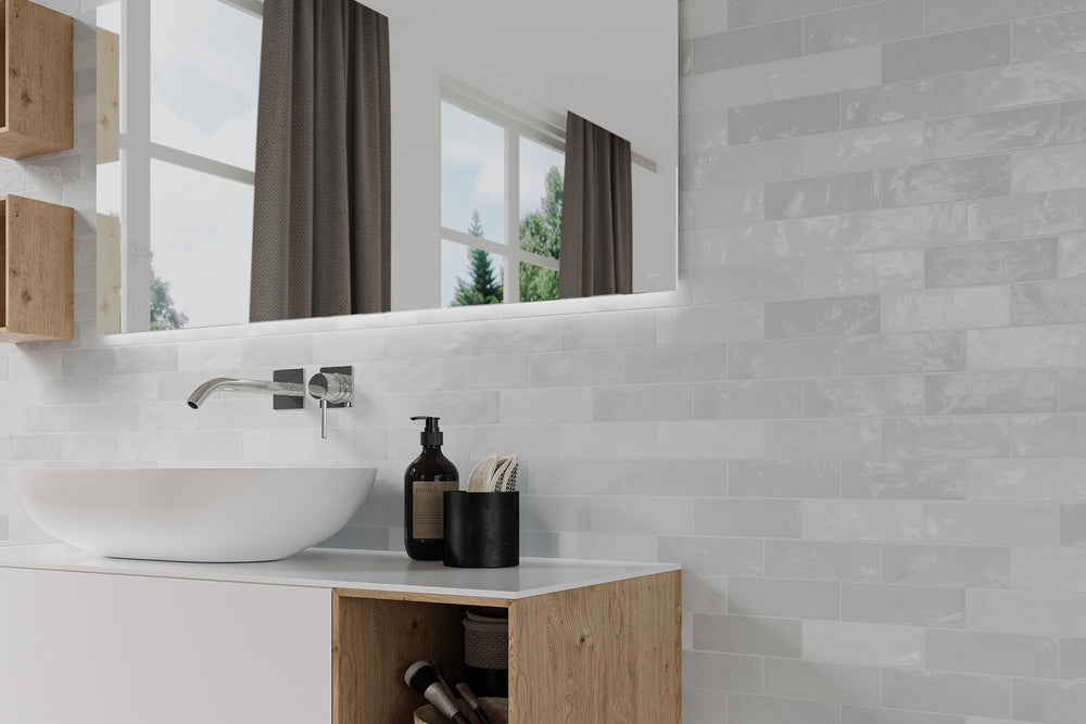 A chic and modern design featuring Safi Grey 2X6 Glossy Ceramic, offering a neutral yet striking appearance with a sleek finish.