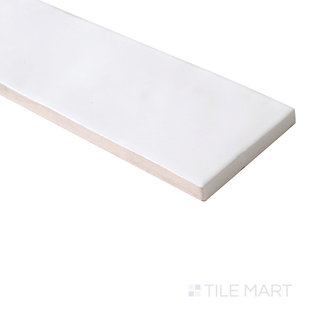 Sleek perspective enhances the crisp, clean shine of Safi White 2X6 Glossy Ceramic, a timeless choice for bright and airy designs.