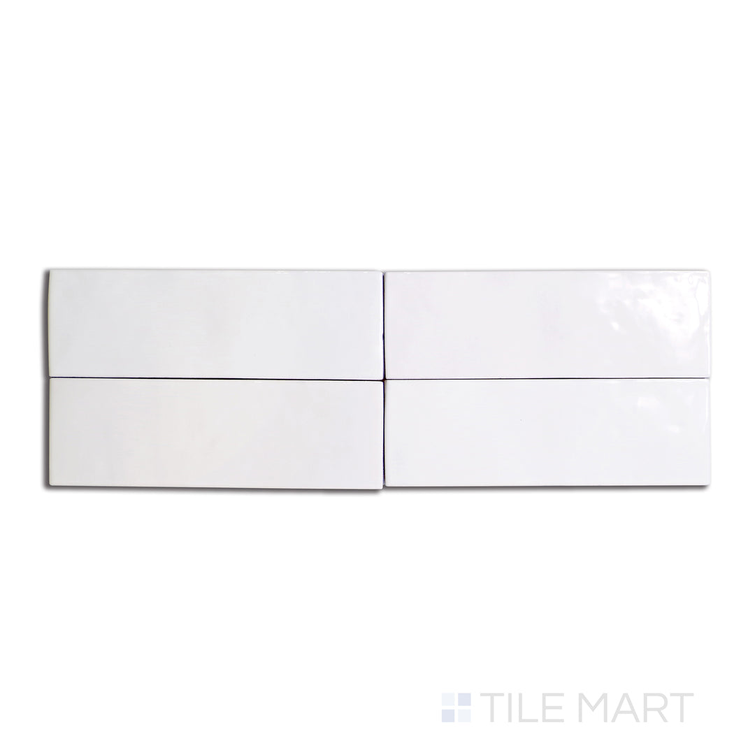 Aerial view of Safi White 2x6 glossy ceramic tile, highlighting a crisp, clean aesthetic with a reflective, polished surface.