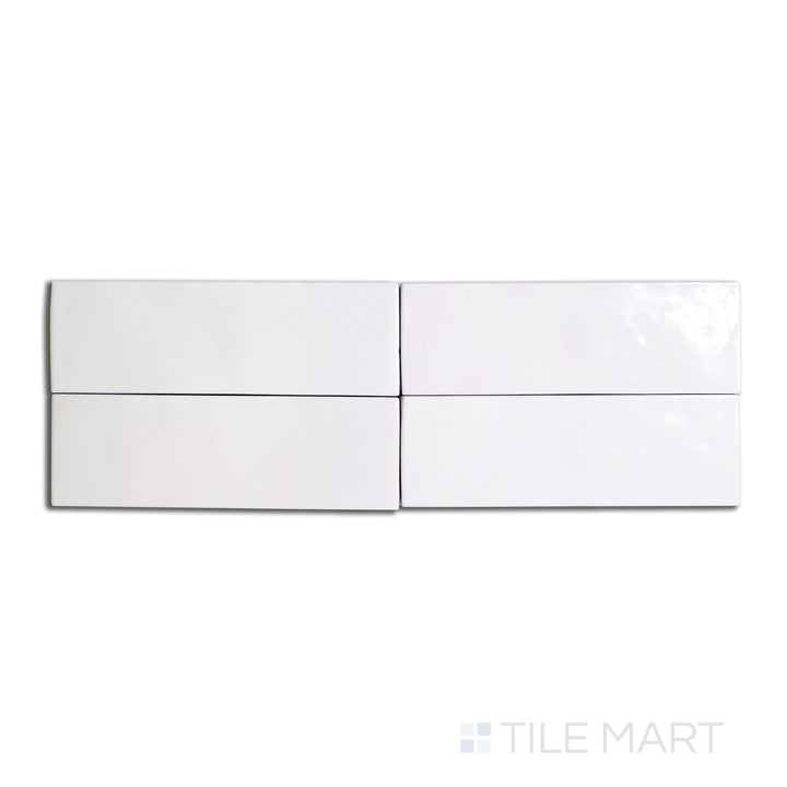 Aerial view of Safi White 2x6 glossy ceramic tile, highlighting a crisp, clean aesthetic with a reflective, polished surface.