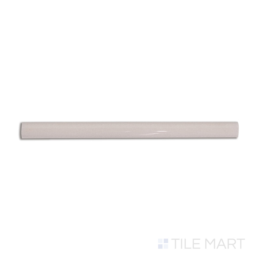 Overhead shot of Safi Nude 0.41x6 glossy ceramic pencil tile, a subtle, warm trim piece ideal for refined edging.