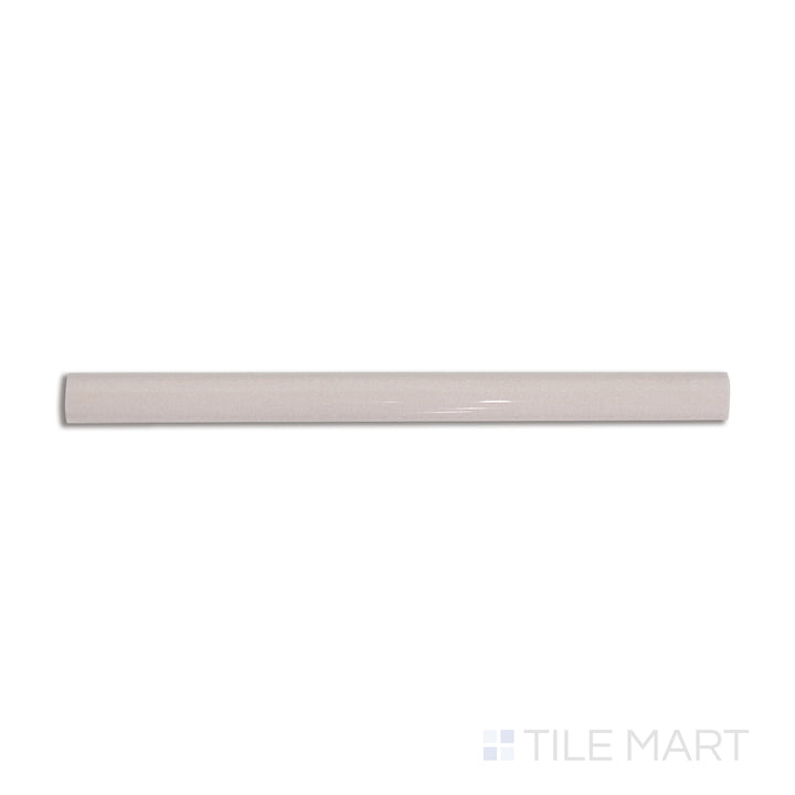 Overhead shot of Safi Nude 0.41x6 glossy ceramic pencil tile, a subtle, warm trim piece ideal for refined edging.