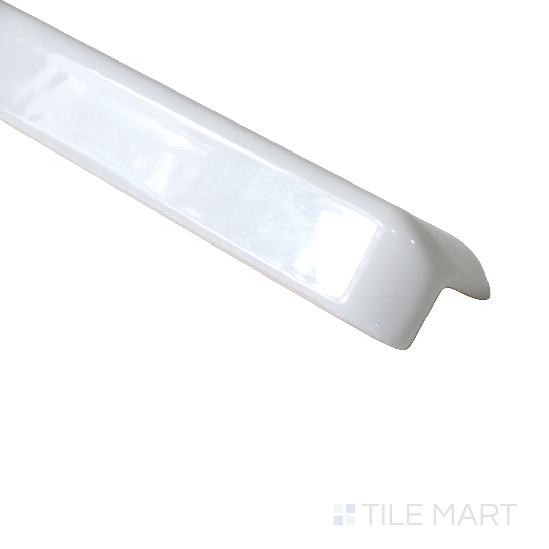 Close-up captures the curved precision of Sanitary Cove Base White 1X6 Glossy Porcelain Outside Corner, enhancing durability and style at exterior angles.