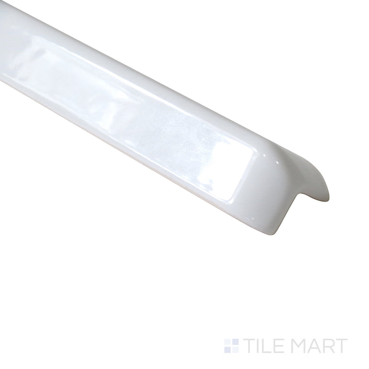 Close-up captures the curved precision of Sanitary Cove Base White 1X6 Glossy Porcelain Outside Corner, enhancing durability and style at exterior angles.