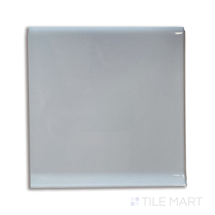 Overhead shot of Sanitary Cove Base Gray 6x6 glossy porcelain tile, featuring a contemporary neutral tone with a high-gloss finish.