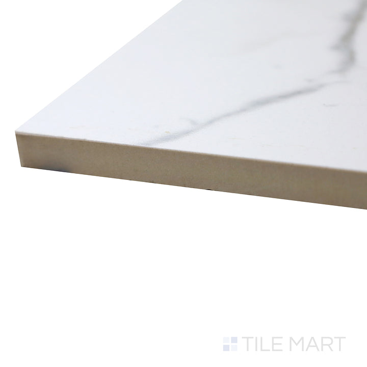 Angled corner shot of Select White Carrara White 24x48 Matte Porcelain Tile, showcasing its expansive size, delicate marble-inspired details, and smooth matte finish.