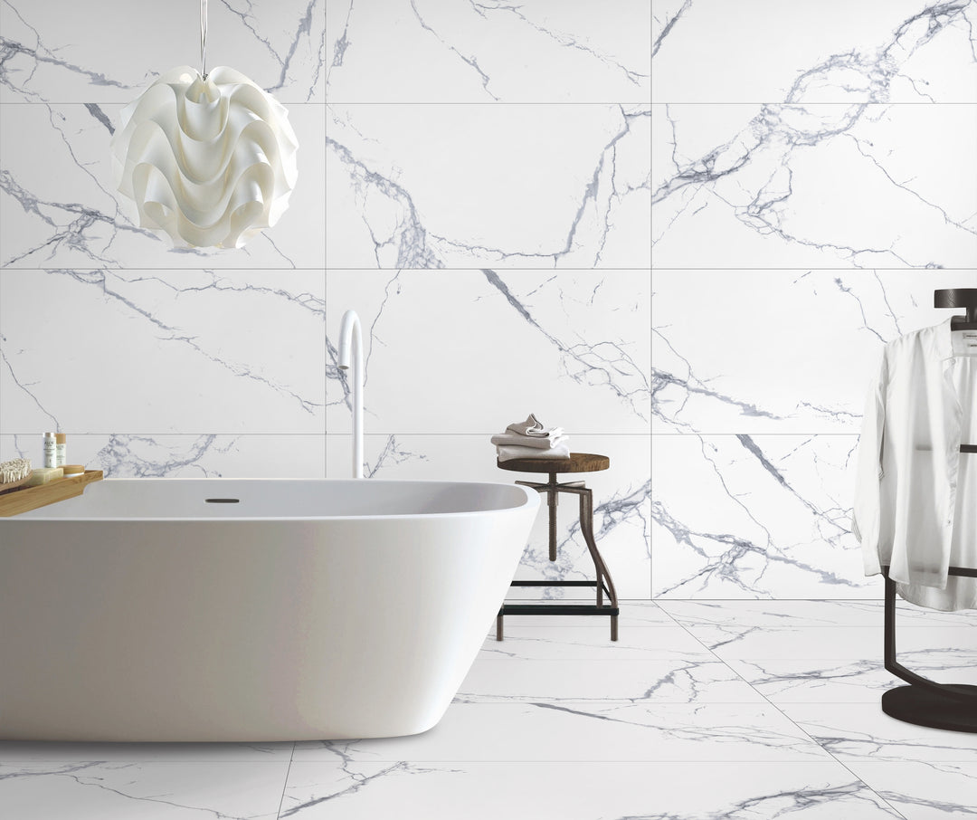A spacious and luxurious setting with Select White Carrara White 24X48 Matte Porcelain, enhancing the ambiance with its natural stone-inspired texture.