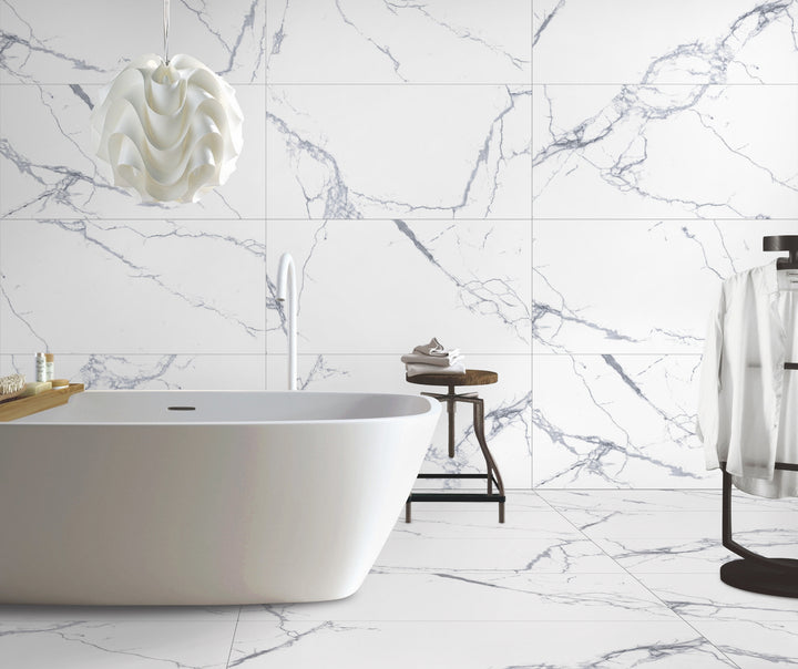 A spacious and luxurious setting with Select White Carrara White 24X48 Matte Porcelain, enhancing the ambiance with its natural stone-inspired texture.