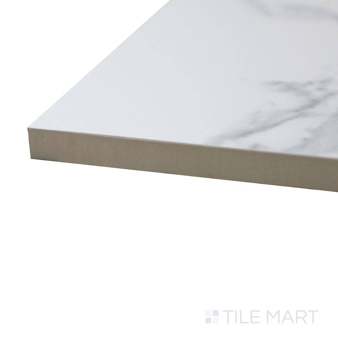 Close-up corner shot of Select White Carrara White 12x24 Polished Porcelain Tile, emphasizing its glossy sheen and realistic marble-like veining.