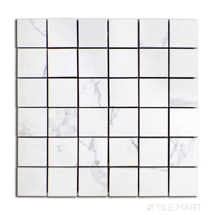 Top-view of Select White Carrara White 2" Square Matte Porcelain Mosaic, displaying a sophisticated matte mosaic with a natural marble look and delicate veining.