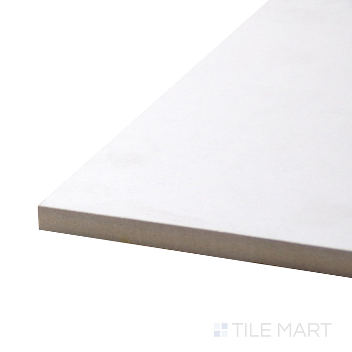 Angled shot of Stonelook Sandstone Ice 12X24 Matte Porcelain, capturing its cool-toned hues and soft stone texture for a contemporary, natural look.