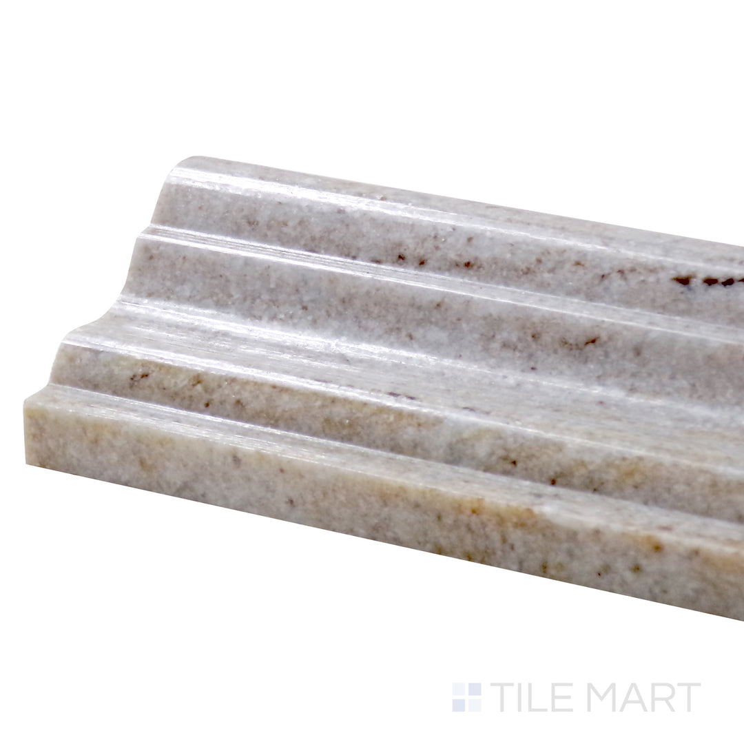Close-up corner view of Sto-Re Ocean White 2.5X12 Polished Marble Chair Rail, emphasizing its soft neutral color and polished, curved profile.