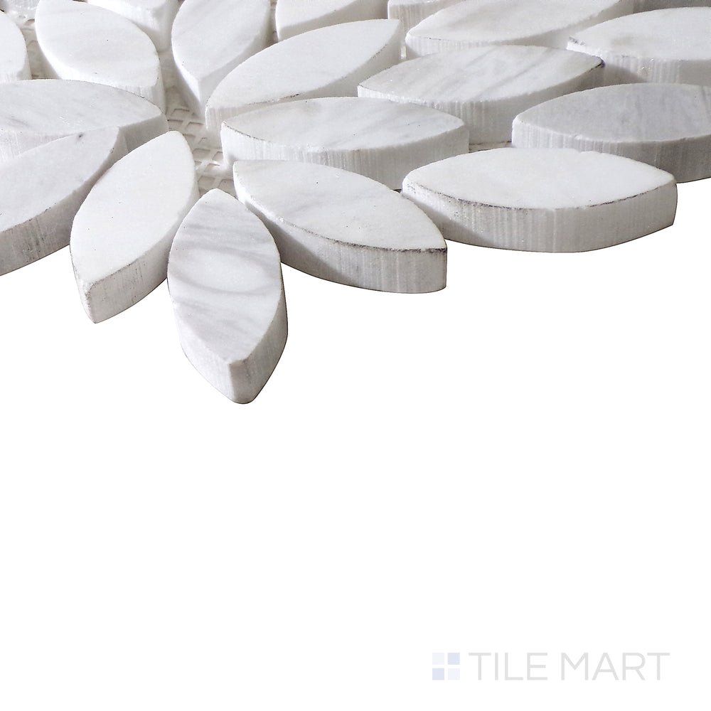 Diagonal view of Sto-Re Volakas floral polished marble mosaic, showcasing its graceful floral accents, polished finish, and natural stone variations.  