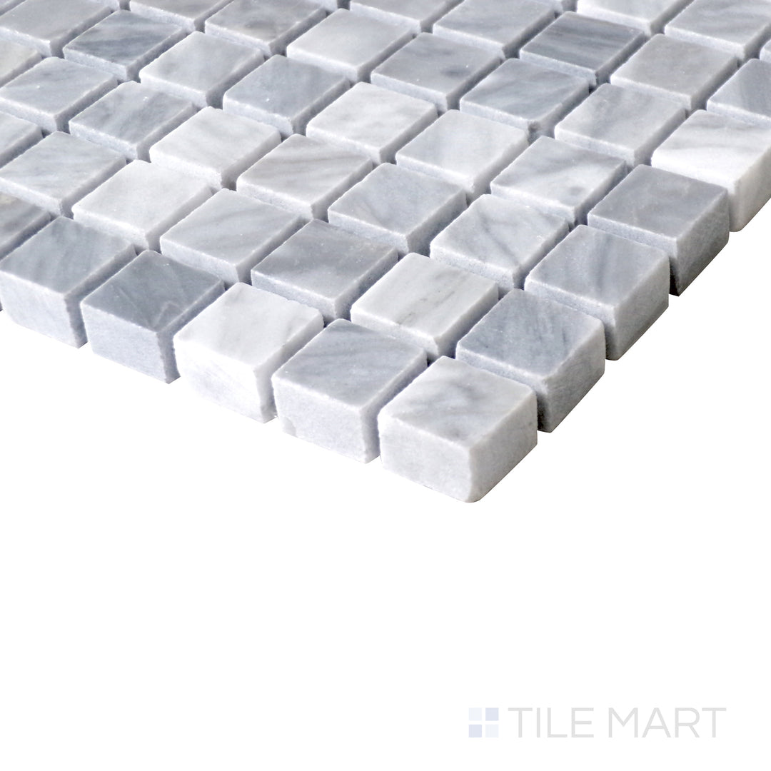 Slanted view of Sto-Re Bardiglio 5/8" mini square polished marble mosaic, highlighting its fine square pattern, smooth finish, and rich natural texture.  