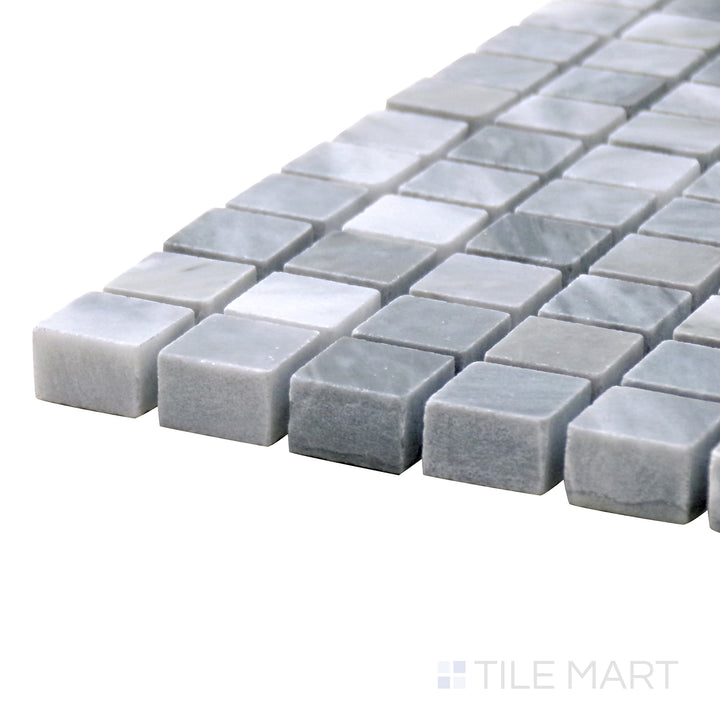 Angled view of Sto-Re Bardiglio 5/8" Mini Square Polished Marble Mosaic, featuring rich gray tones with a high-gloss finish for a refined, structured look.