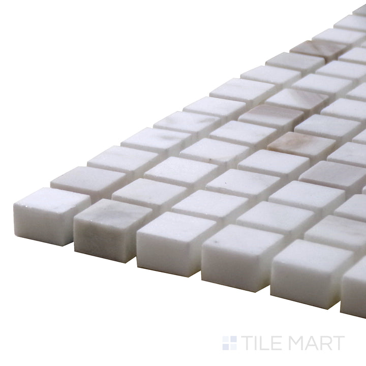 Detailed side view of Sto-Re Volakas 5/8" Mini Square Polished Marble Mosaic, capturing its subtle gray veining and polished sheen for an upscale appeal.