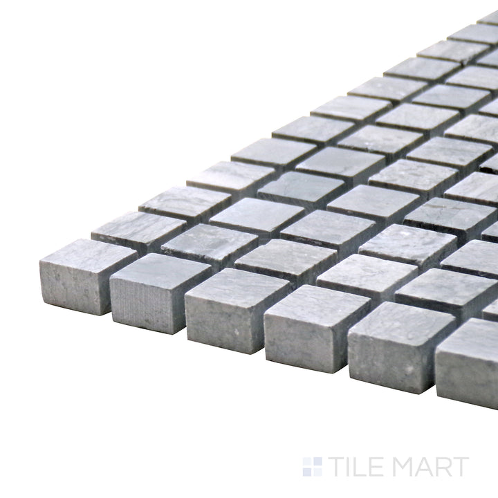 Corner angle of Sto-Re Wooden Blue 5/8" Mini Square Polished Marble Mosaic, showcasing its soft blue-gray hues and glossy surface for a distinctive look.