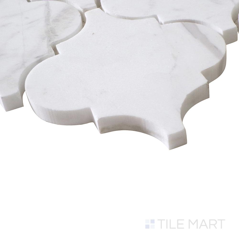 Angled perspective of Sto-Re Volakas Arabesque polished marble mosaic, showcasing its graceful flowing patterns, soft veining, and high-end polished finish.  