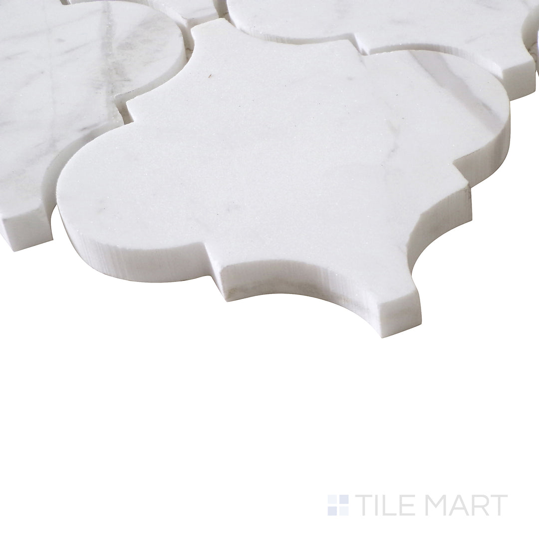 Angled perspective of Sto-Re Volakas Arabesque polished marble mosaic, showcasing its graceful flowing patterns, soft veining, and high-end polished finish.  