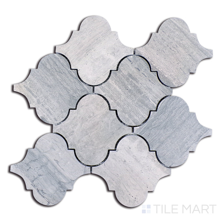 Flat lay of Sto-Re Wooden Blue Arabesque Polished Marble Mosaic, presenting a captivating deep blue-grey marble in an elegant arabesque pattern.
