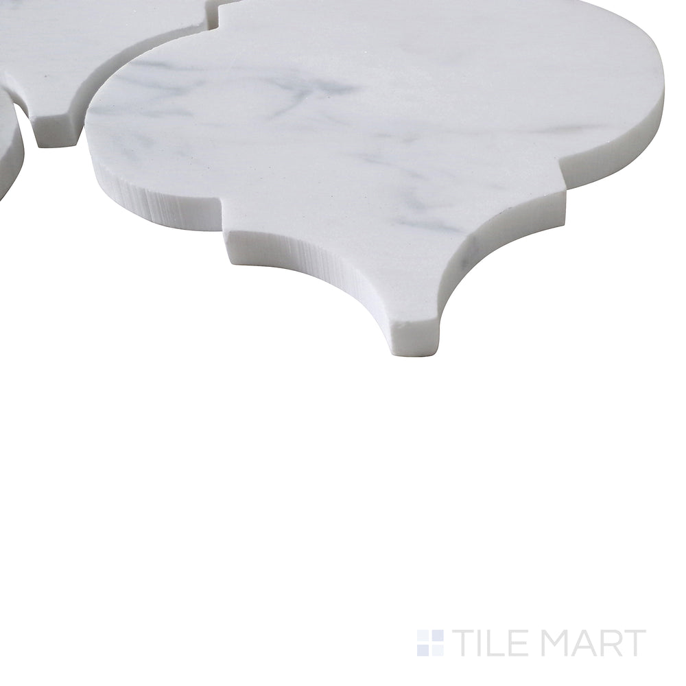 Diagonal angle of Sto-Re Carrara Arabesque polished marble mosaic, capturing its timeless white base, delicate gray veining, and refined arabesque design.  