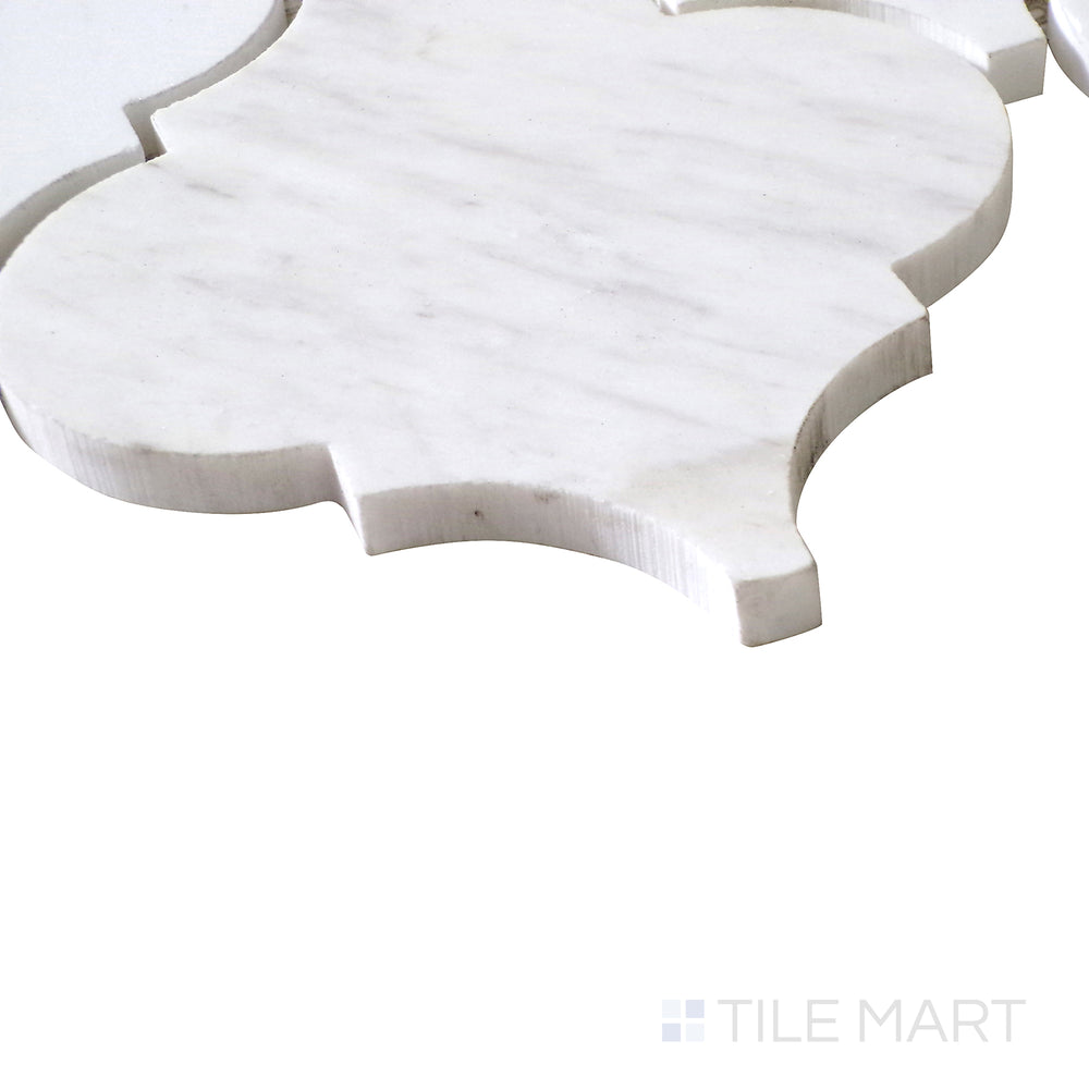 Diagonal shot of Sto-Re Volakas Arabesque polished marble mosaic, emphasizing its soft veining, polished finish, and graceful arabesque design.  