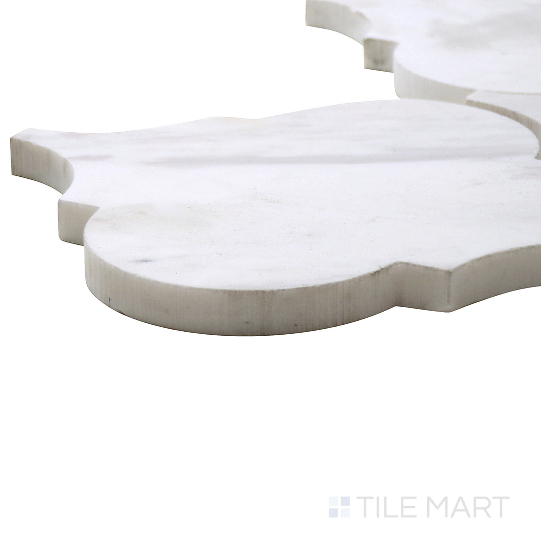 Close-up corner angle of Sto-Re Volakas Arabesque Polished Marble Mosaic, featuring soft gray marble patterns shaped into an elegant arabesque motif.