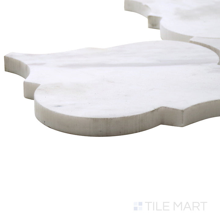 Close-up corner angle of Sto-Re Volakas Arabesque Polished Marble Mosaic, featuring soft gray marble patterns shaped into an elegant arabesque motif.