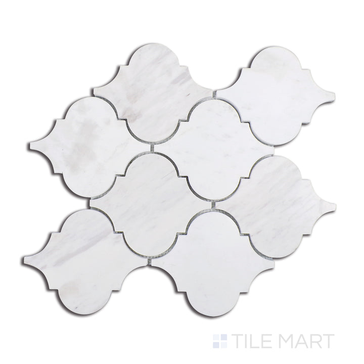 Close-up of Sto-Re Volakas Arabesque Polished Marble Mosaic, featuring a rich white marble with intricate grey veining in a stylish arabesque motif.