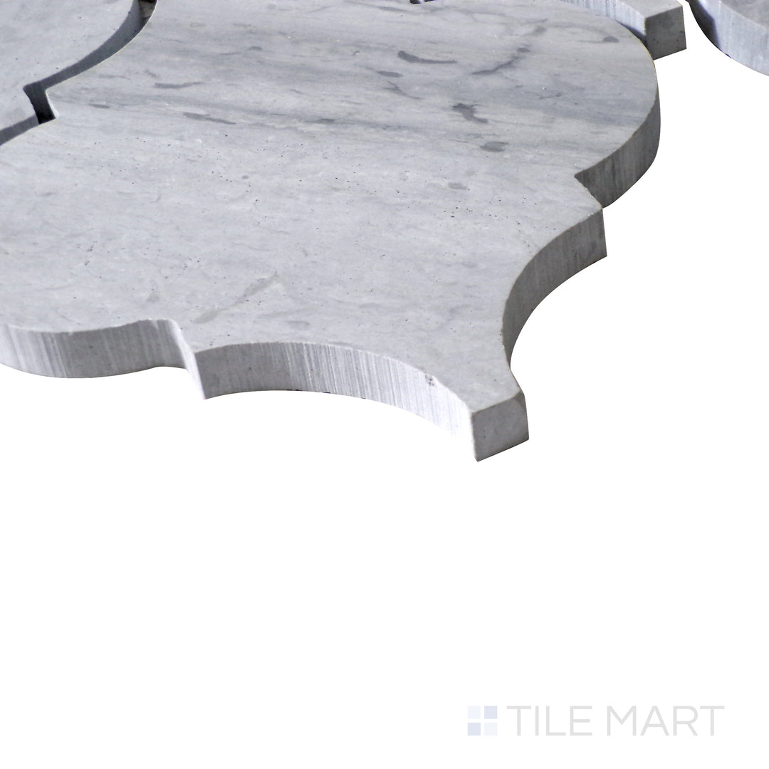 Slanted perspective of Sto-Re Wooden Blue Arabesque polished marble mosaic, highlighting its unique wood-like hues, flowing arabesque shapes, and glossy texture.  