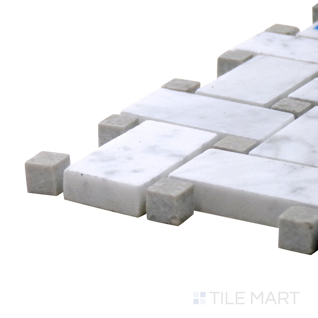 Angled view of Sto-Re Carrara W/ Grey Dot Basketweave Polished Marble Mosaic, showcasing its elegant white Carrara base with subtle gray dots in a woven pattern.