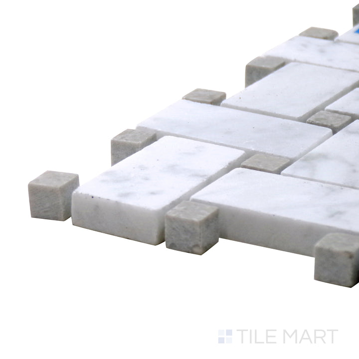 Angled view of Sto-Re Carrara W/ Grey Dot Basketweave Polished Marble Mosaic, showcasing its elegant white Carrara base with subtle gray dots in a woven pattern.