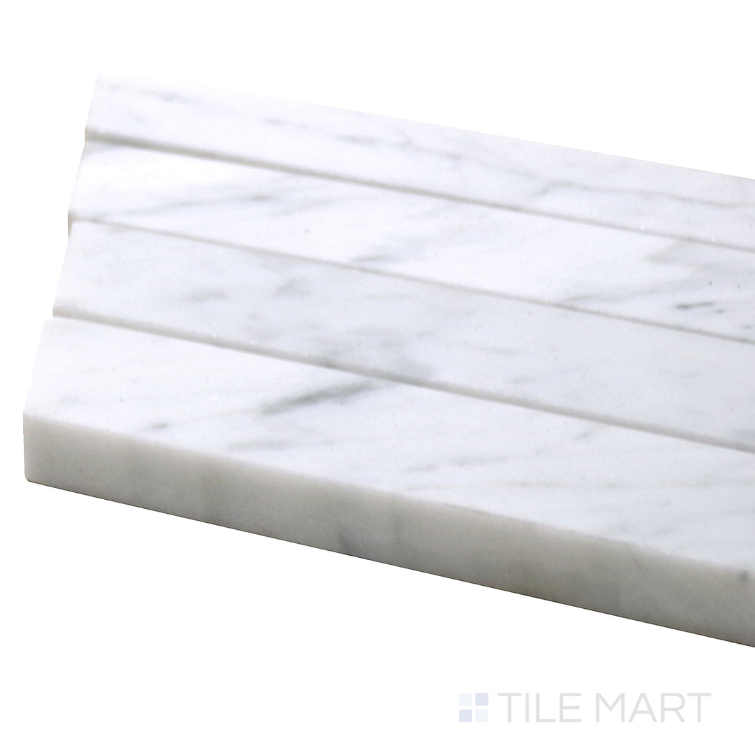 Corner angle of Sto-Re Carrara Chevron Polished Marble Mosaic, displaying its refined white marble with soft gray veining in a modern chevron layout.