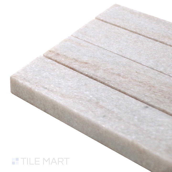 Side perspective of Sto-Re Ocean White Chevron Polished Marble Mosaic, emphasizing its clean white tones and glossy chevron pattern for a fresh, contemporary style.