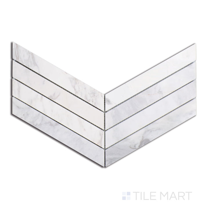 Close-up of Sto-Re Volakas Chevron Polished Marble Mosaic, displaying soft white Volakas marble with graceful grey veining in a striking chevron formation.