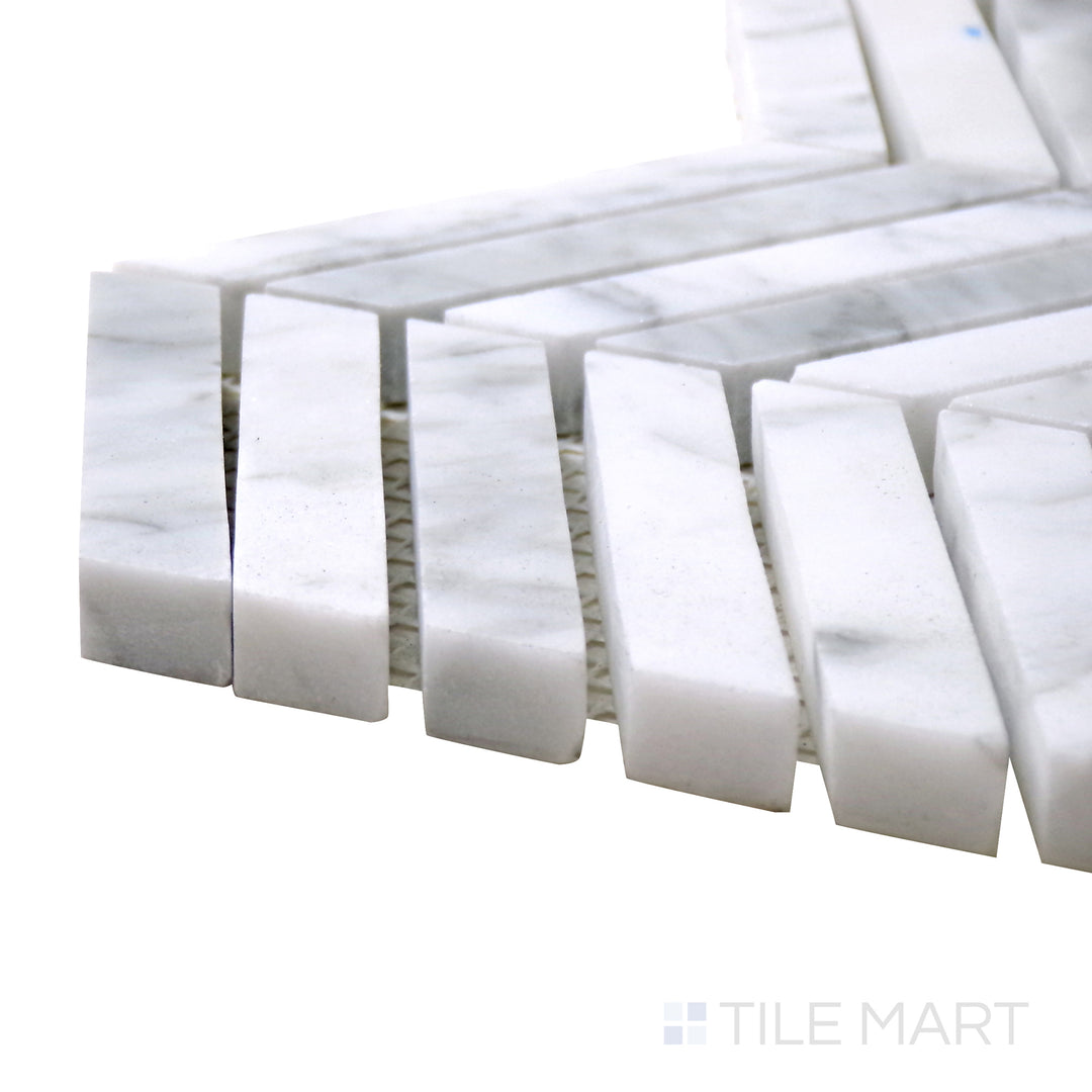 Detailed corner shot of Sto-Re Carrara Chevron Polished Marble Mosaic, featuring classic white Carrara marble with a flowing chevron design.