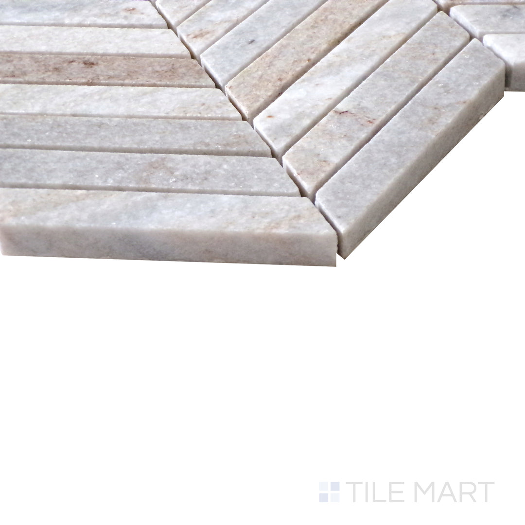 Diagonal angle of Sto-Re Ocean White Chevron polished marble mosaic, showcasing its bright white tones, natural veining, and contemporary chevron pattern.  