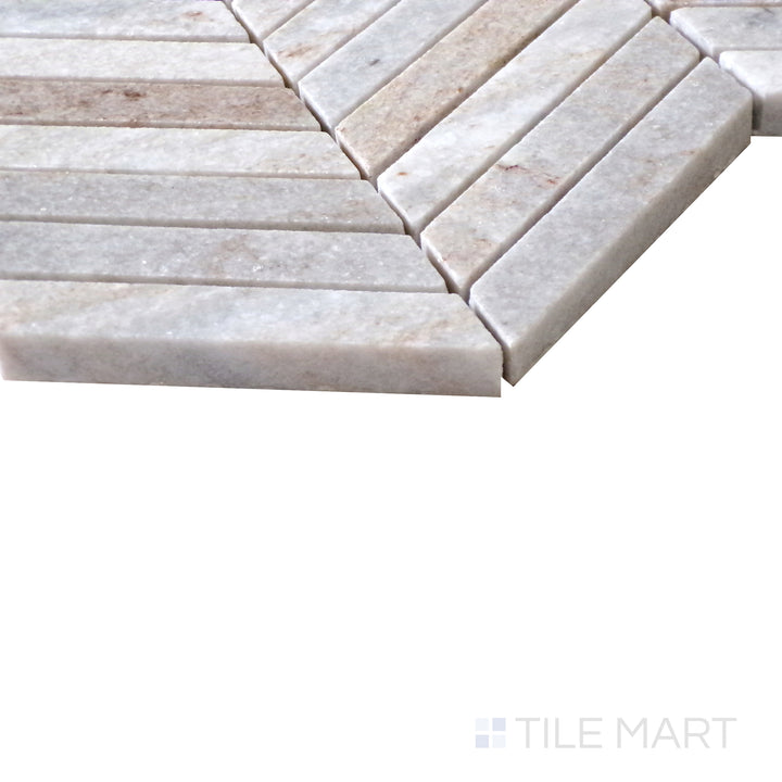 Diagonal angle of Sto-Re Ocean White Chevron polished marble mosaic, showcasing its bright white tones, natural veining, and contemporary chevron pattern.  