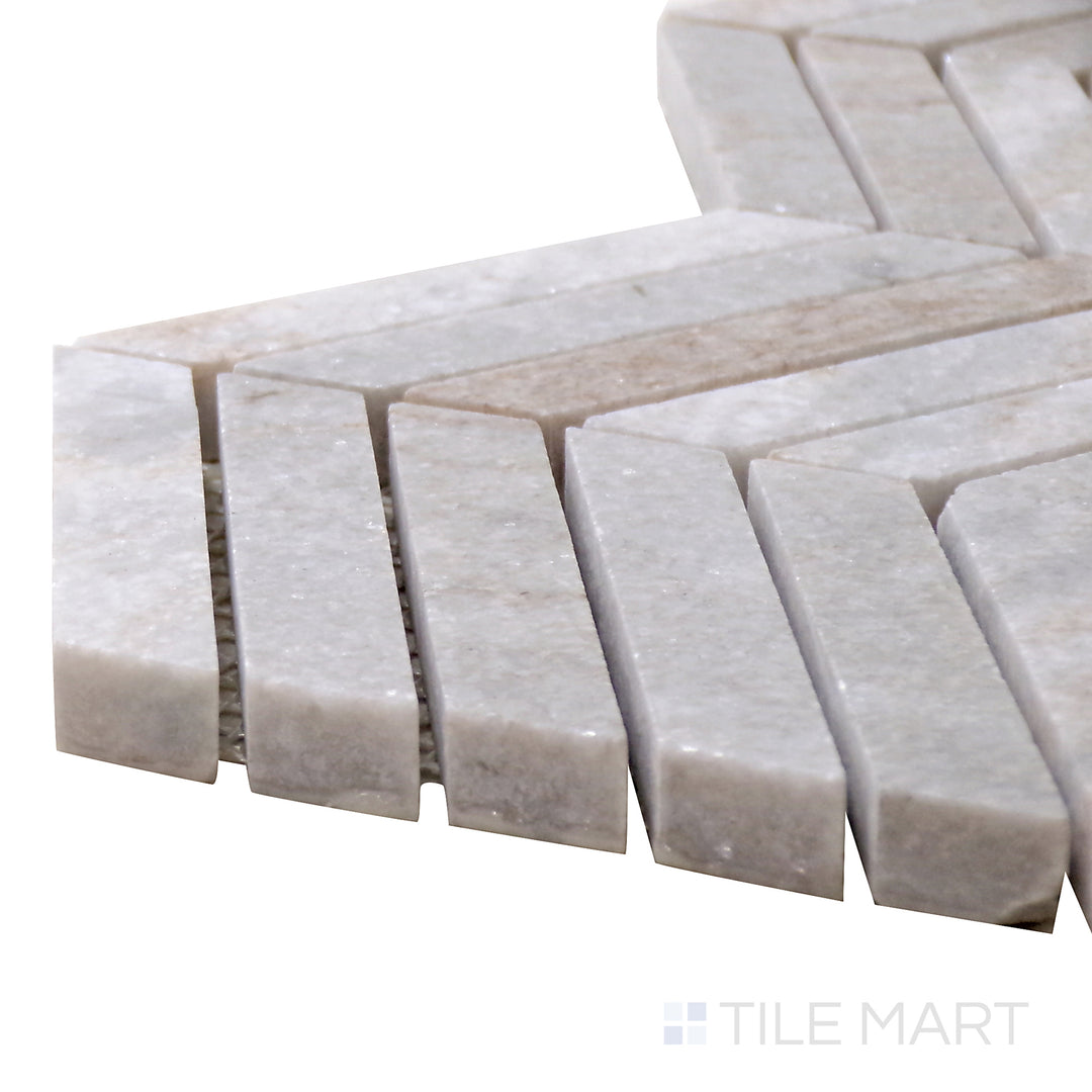 Angled perspective of Sto-Re Ocean White Chevron Polished Marble Mosaic, emphasizing its neutral white surface and bold chevron shape for a modern touch.