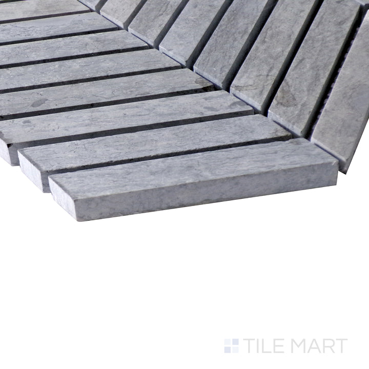 Diagonal view of Sto-Re Wooden Blue Chevron polished marble mosaic, showcasing its unique blend of blue-gray hues, structured chevron pattern, and polished surface.  