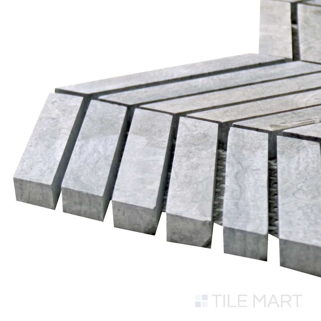 Side angle of Sto-Re Wooden Blue Chevron Polished Marble Mosaic, showcasing its cool blue-gray tones with a glossy chevron pattern for a statement finish.