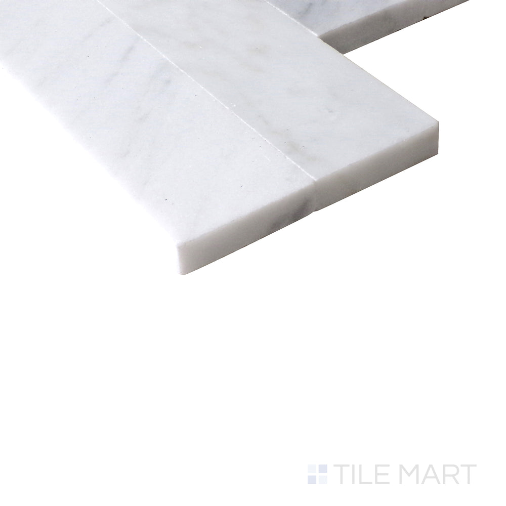 Angled view of Sto-Re Carrara Culture Pattern polished marble mosaic, featuring elegant white marble with delicate gray veining in a structured pattern.  