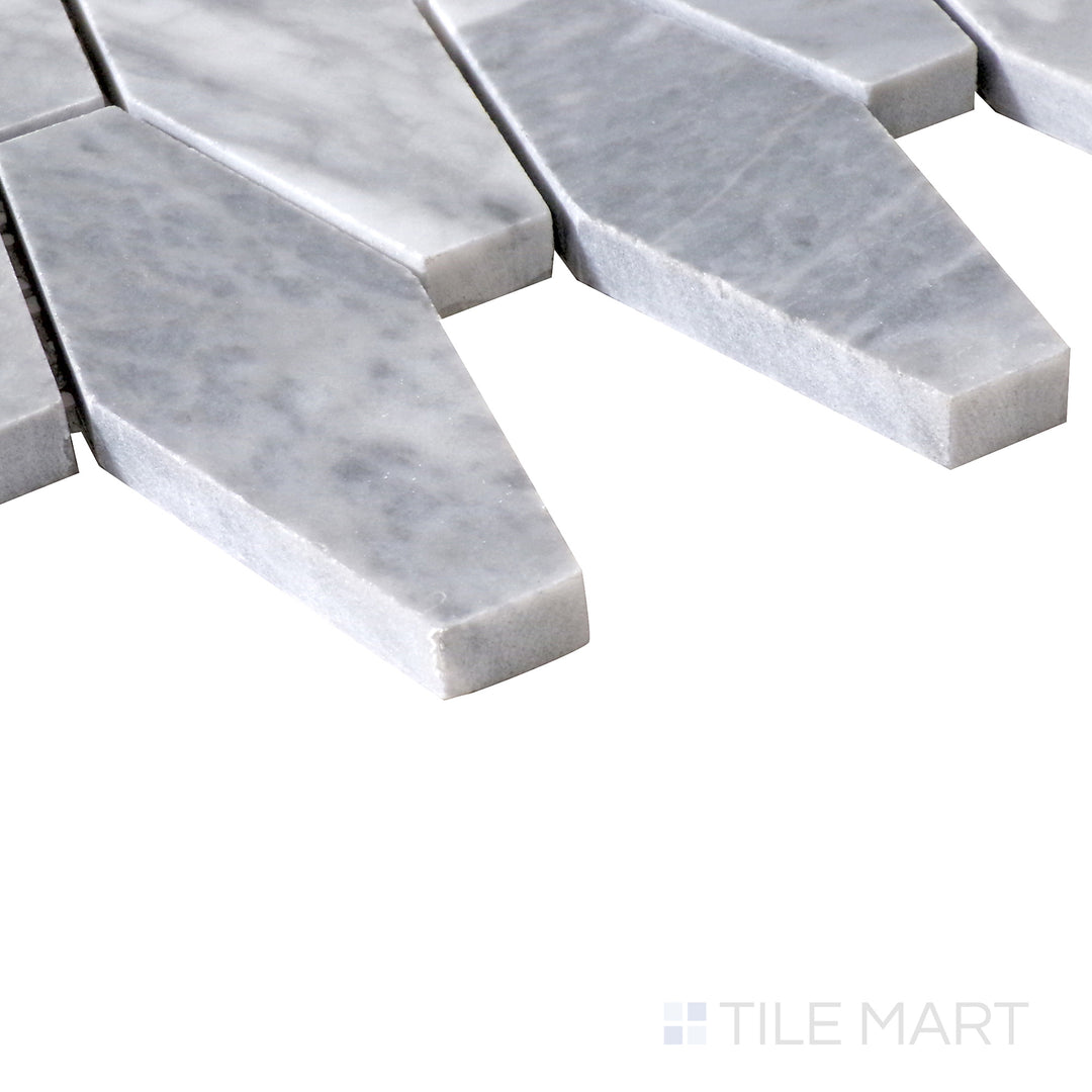 Angled shot of Sto-Re Bardiglio Elongated Hexagon polished marble mosaic, highlighting its deep gray tones, elongated hexagonal shapes, and glossy finish.  