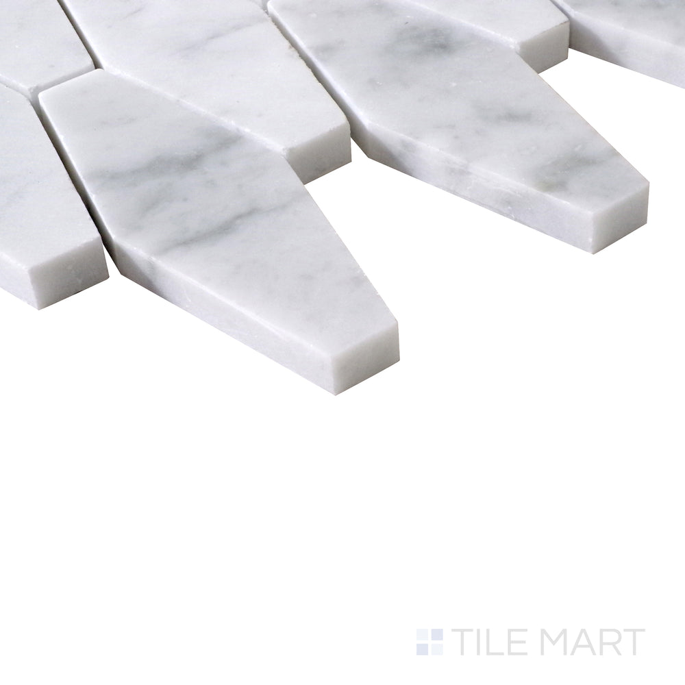 Diagonal view of Sto-Re Carrara Elongated Hexagon polished marble mosaic, featuring soft white marble with intricate gray veining and a distinctive hexagonal pattern.  