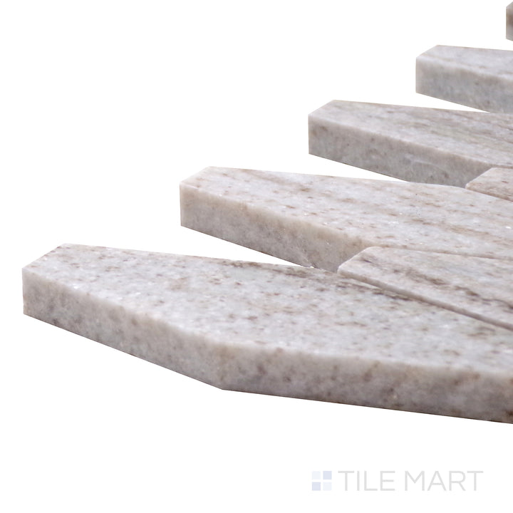 Angled close-up of Sto-Re Ocean White Elongated Hexagon Polished Marble Mosaic, featuring its soft, off-white marble tones and geometric elegance.