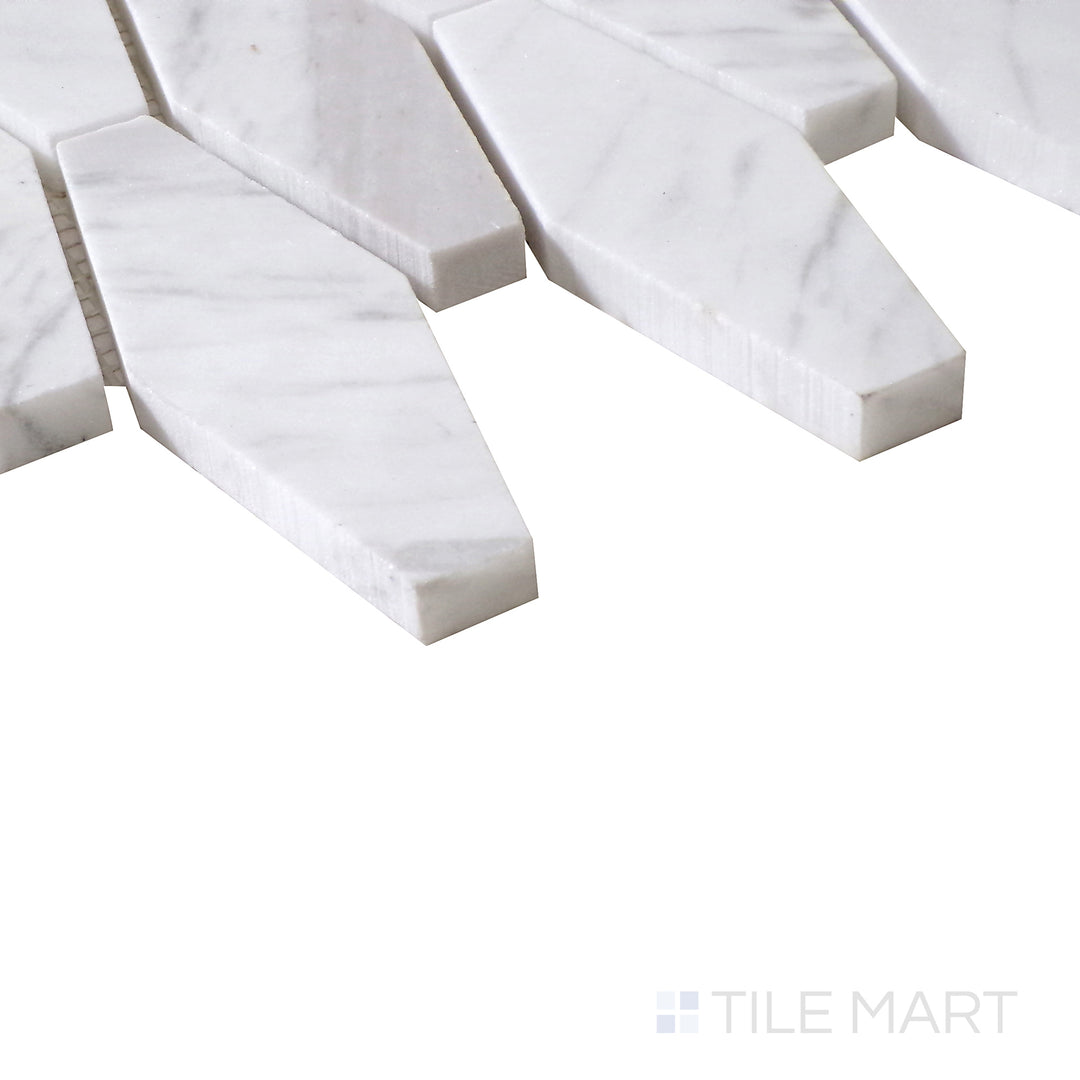 Angled shot of Sto-Re Volakas Elongated Hexagon polished marble mosaic, emphasizing its refined veining, structured hexagonal layout, and high-gloss polish.  