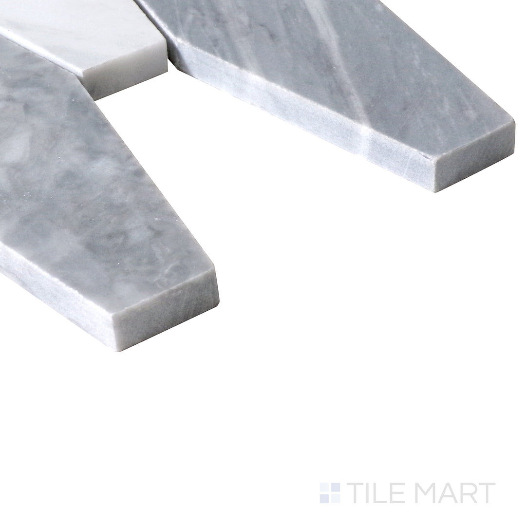 Angled shot of Sto-Re Bardiglio Elongated Hexagon polished marble mosaic, highlighting its deep gray tones, elongated hexagonal pattern, and polished finish.  