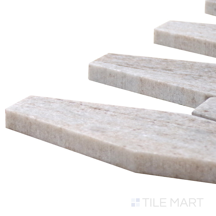 Angled shot of Sto-Re Ocean White Elongated Hexagon Polished Marble Mosaic, capturing its refined white tones and geometric pattern with a polished finish.